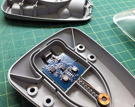 Internal view of the charger for OrthroAccell tooth straightening device