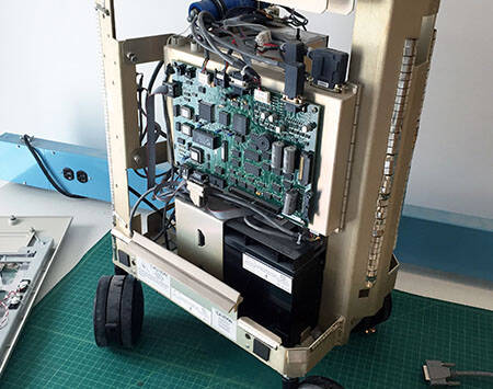 A intra-aortic balloon pump machine with the cover removed.